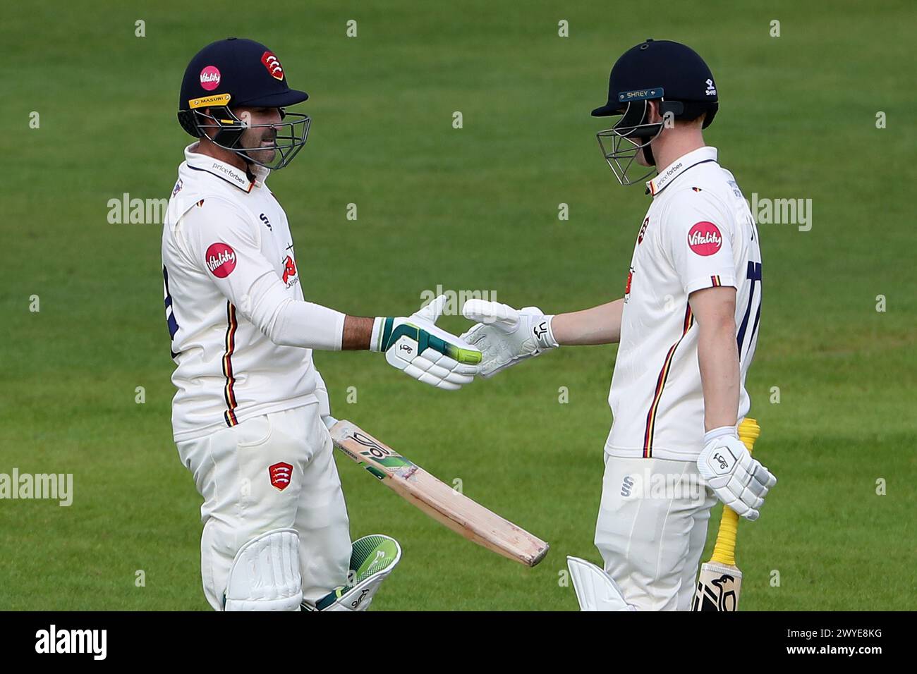 Jordan Cox of Essex congratulates Dean Elgar (L) on reaching his fifty during Nottinghamshire CCC vs Essex CCC, Vitality County Championship Division Stock Photo