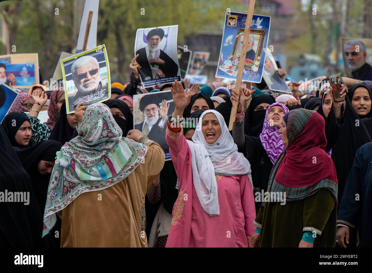 Srinagar, India. 05th Apr, 2024. Muslim women hold placards as they ...