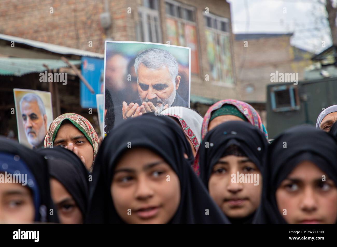 Srinagar, India. 05th Apr, 2024. Muslim women hold placards as they ...