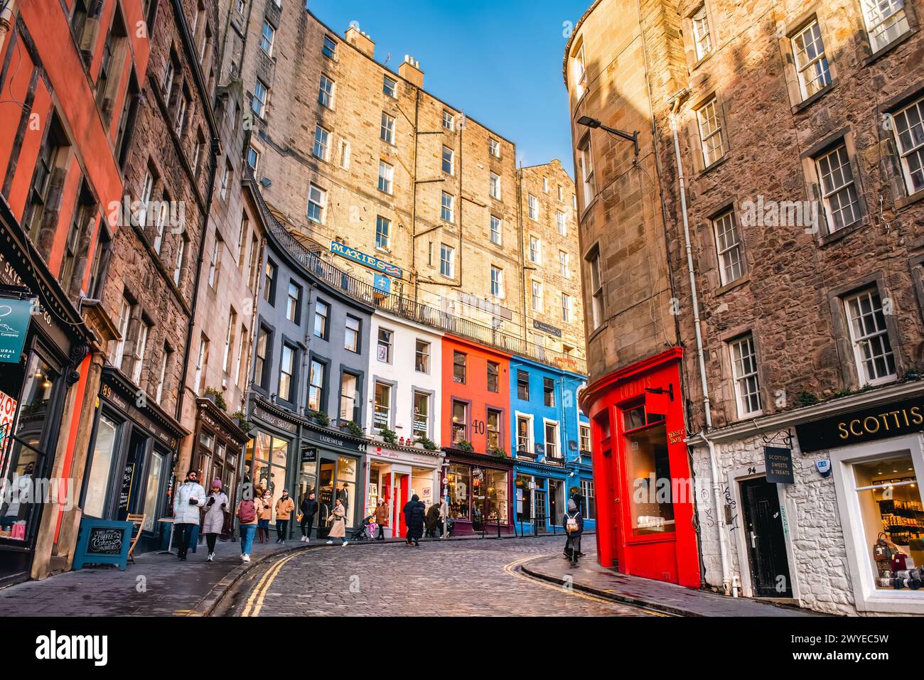 Edinburgh, Scotland - January 22nd 2024: colorful store fronts and old architecture along West Bow and Victoria Street in Edinburgh Old Town Stock Photo