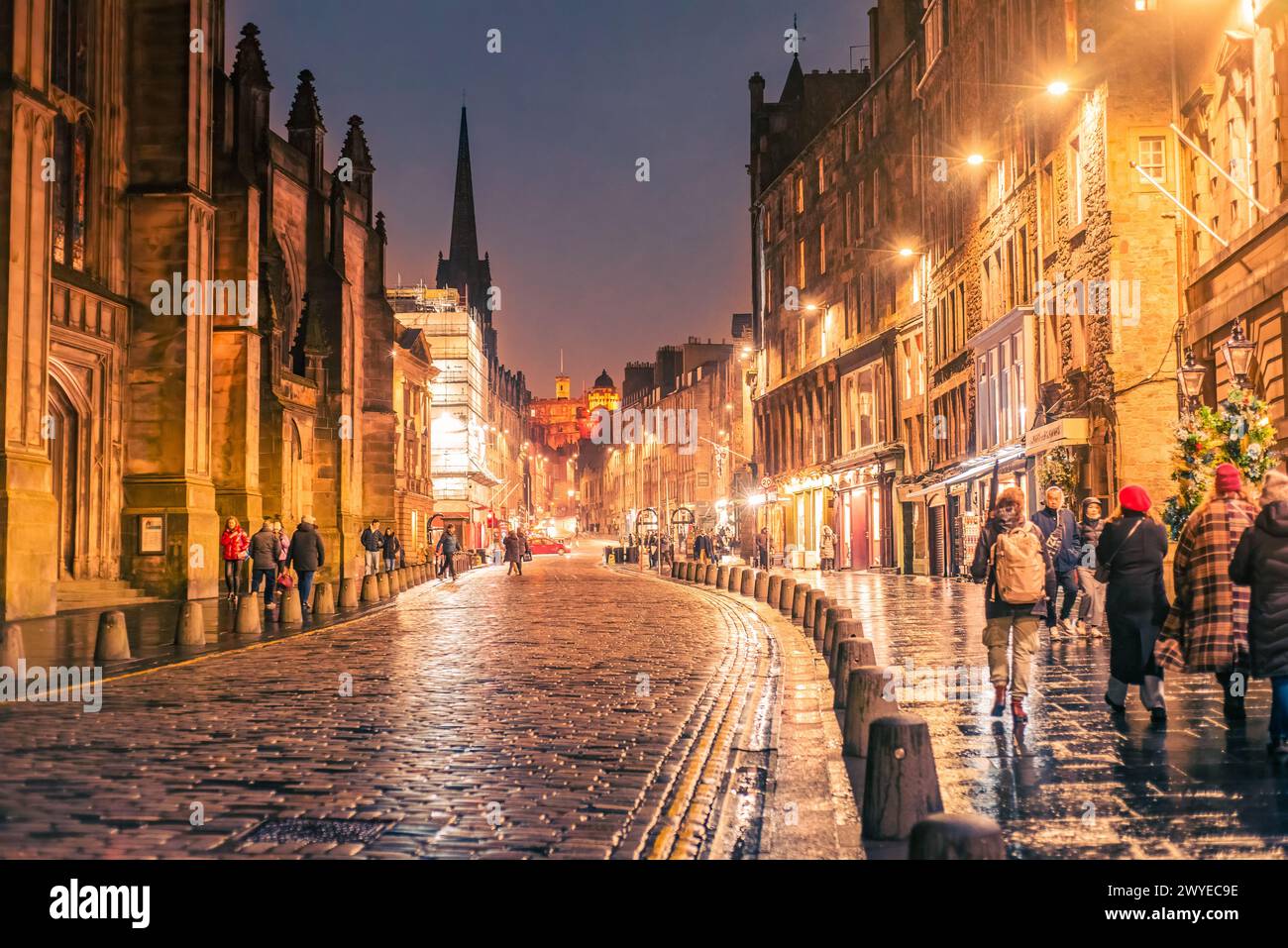 Edinburgh, Scotland - January 22nd, 2024: a night view of the High Street, a stretch also known as the Royal Mile, in the Old Town Stock Photo