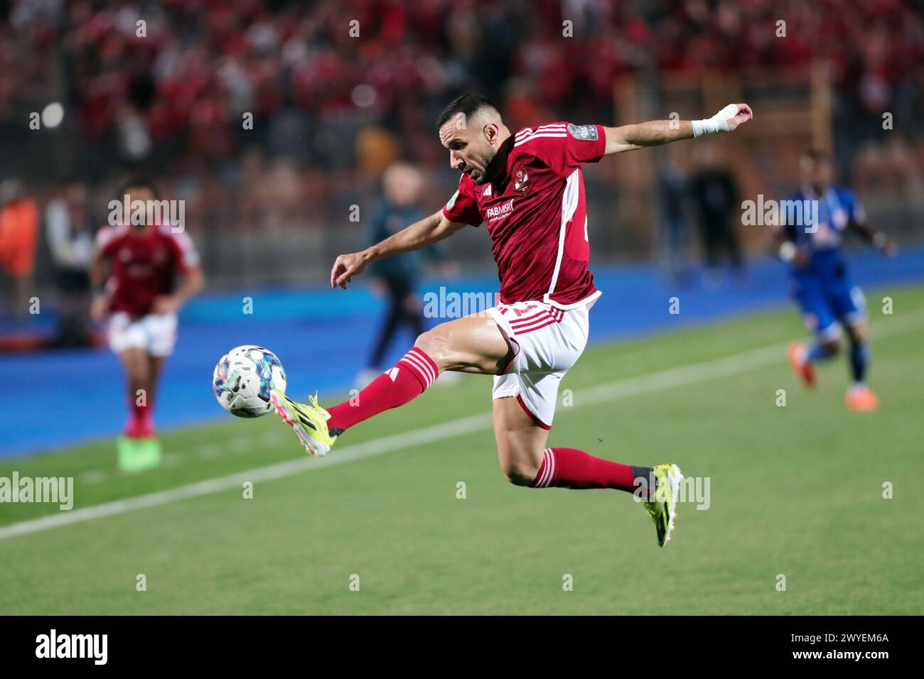 Cairo, Egypt. 5th Apr, 2024. Ali Maaloul of Al Ahly competes during the CAF Champions League quarter-final match between Al Ahly of Egypt and Simba of Tanzania in Cairo, Egypt, April 5, 2024. Credit: Ahmed Gomaa/Xinhua/Alamy Live News Stock Photo