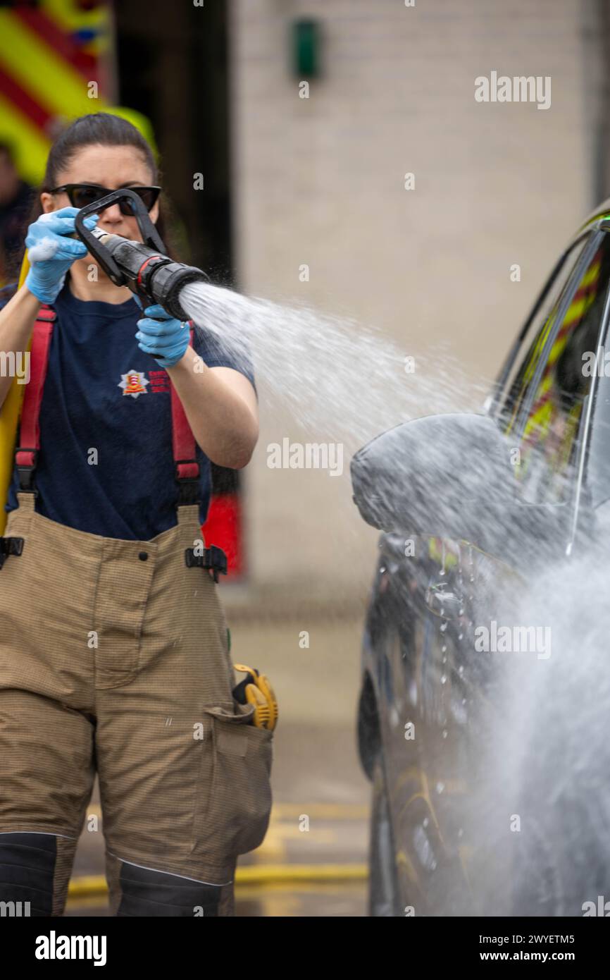 Brentwood Essex 6th April 2024 Essex Firefighters carry out a charity car wash at Brentwood Fire Station The event was in aid of the Fire Fighters charity. Credit: Ian Davidson/Alamy Live News Stock Photo