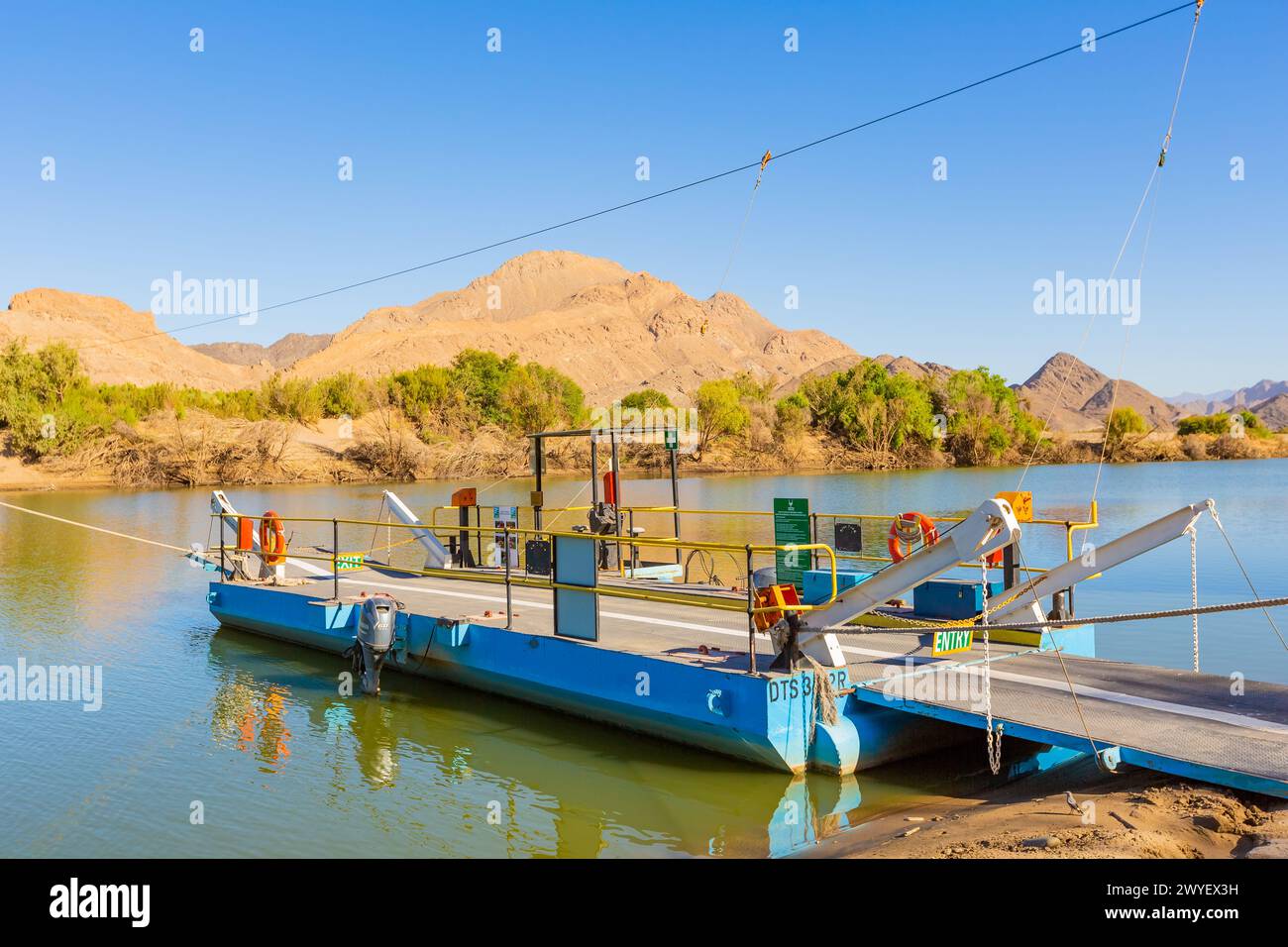 Richtersveld, South Africa - March 15, 2024: Pontoon ferry boat river crossing on the Orange River at Senderlingsdrif Stock Photo