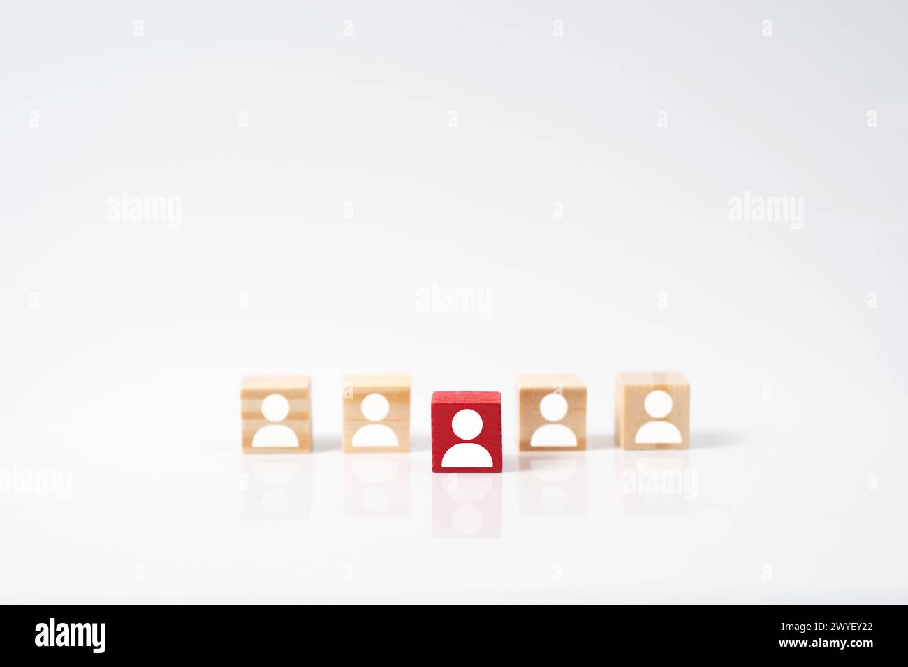 Focus red human icon on wooden block, choice of employee leader from ...