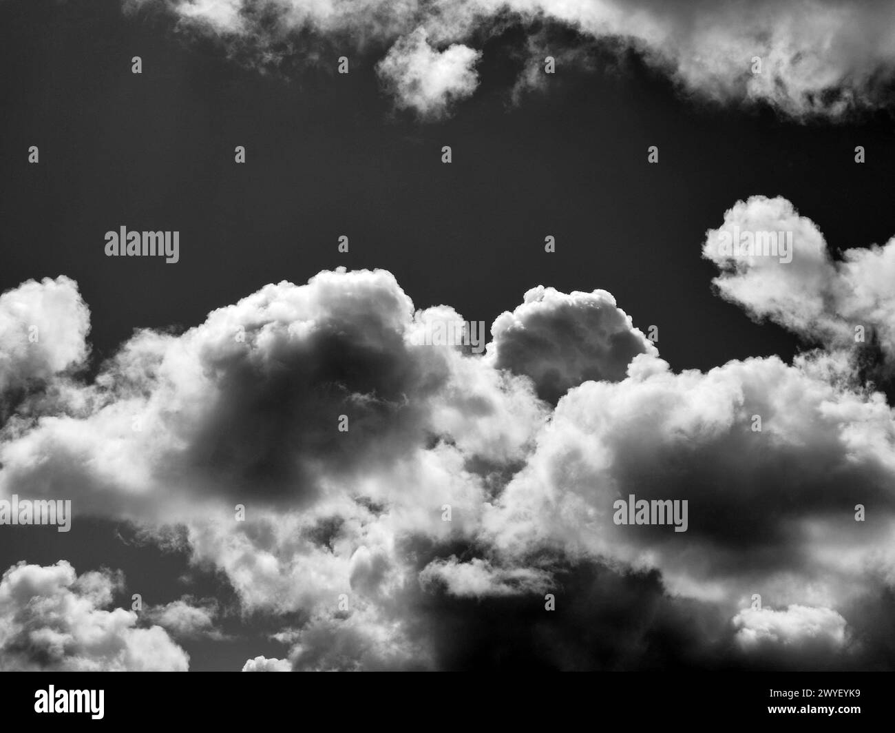 Black and white clouds in the sky background Stock Photo - Alamy