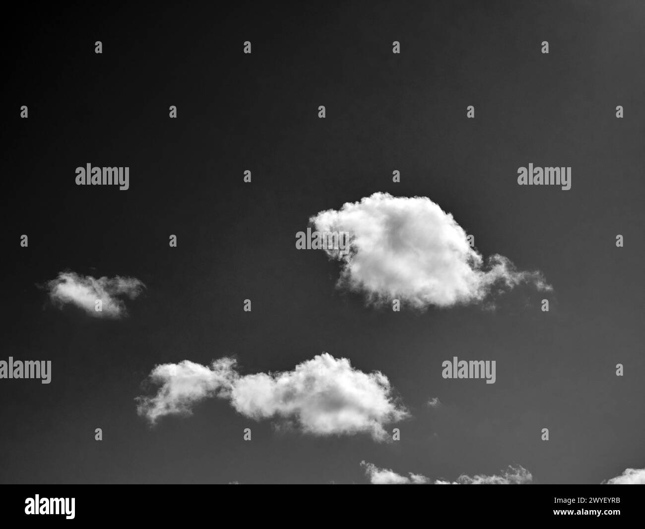Black and white clouds in the sky background Stock Photo - Alamy