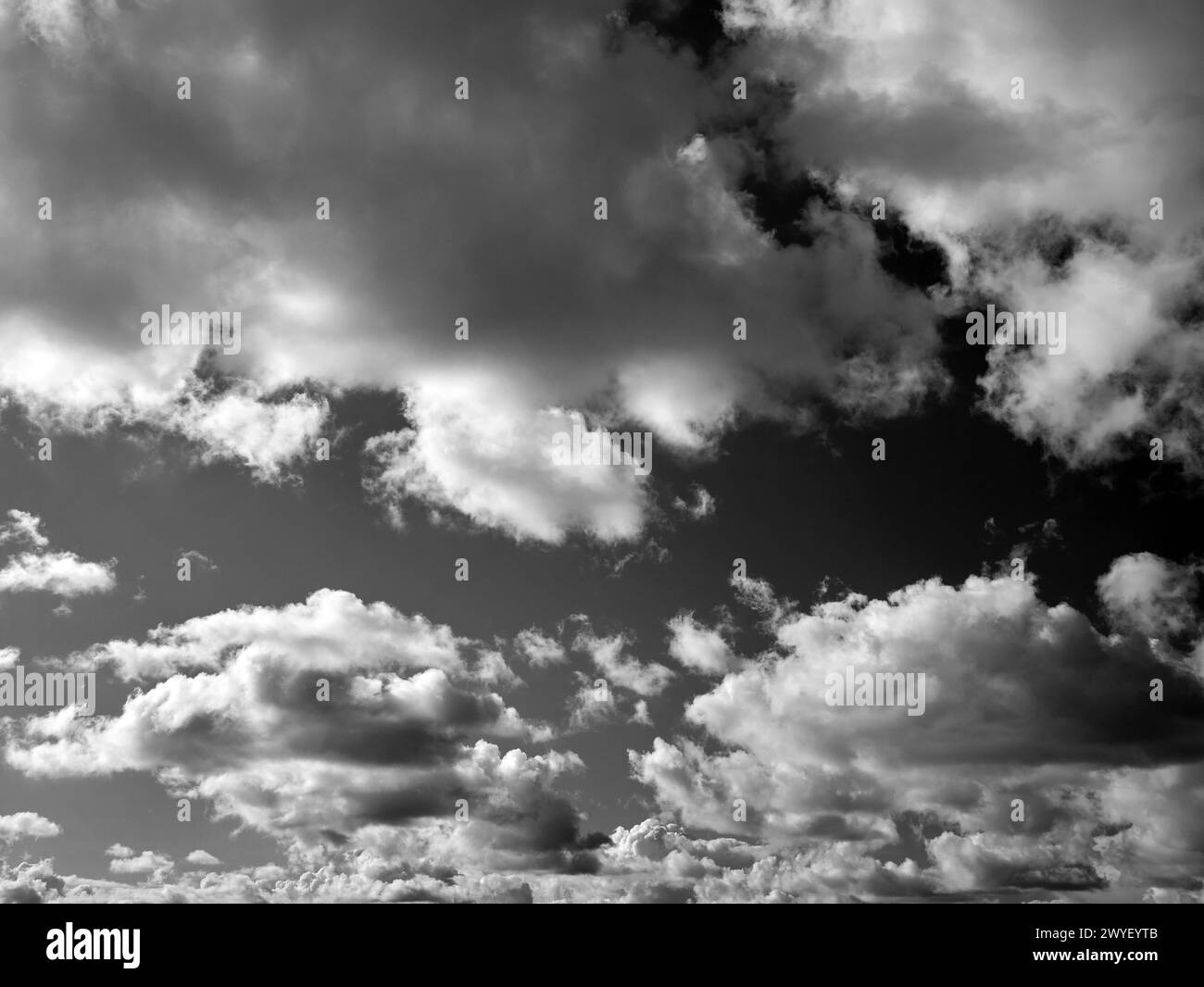 Black and white clouds in the sky background Stock Photo - Alamy