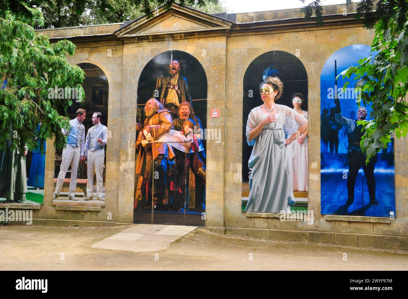 Scenes from various productions of Shakespeares play decorate this classical styled wall close to the Royal Shakespeare Company theatres in Stratford Stock Photo