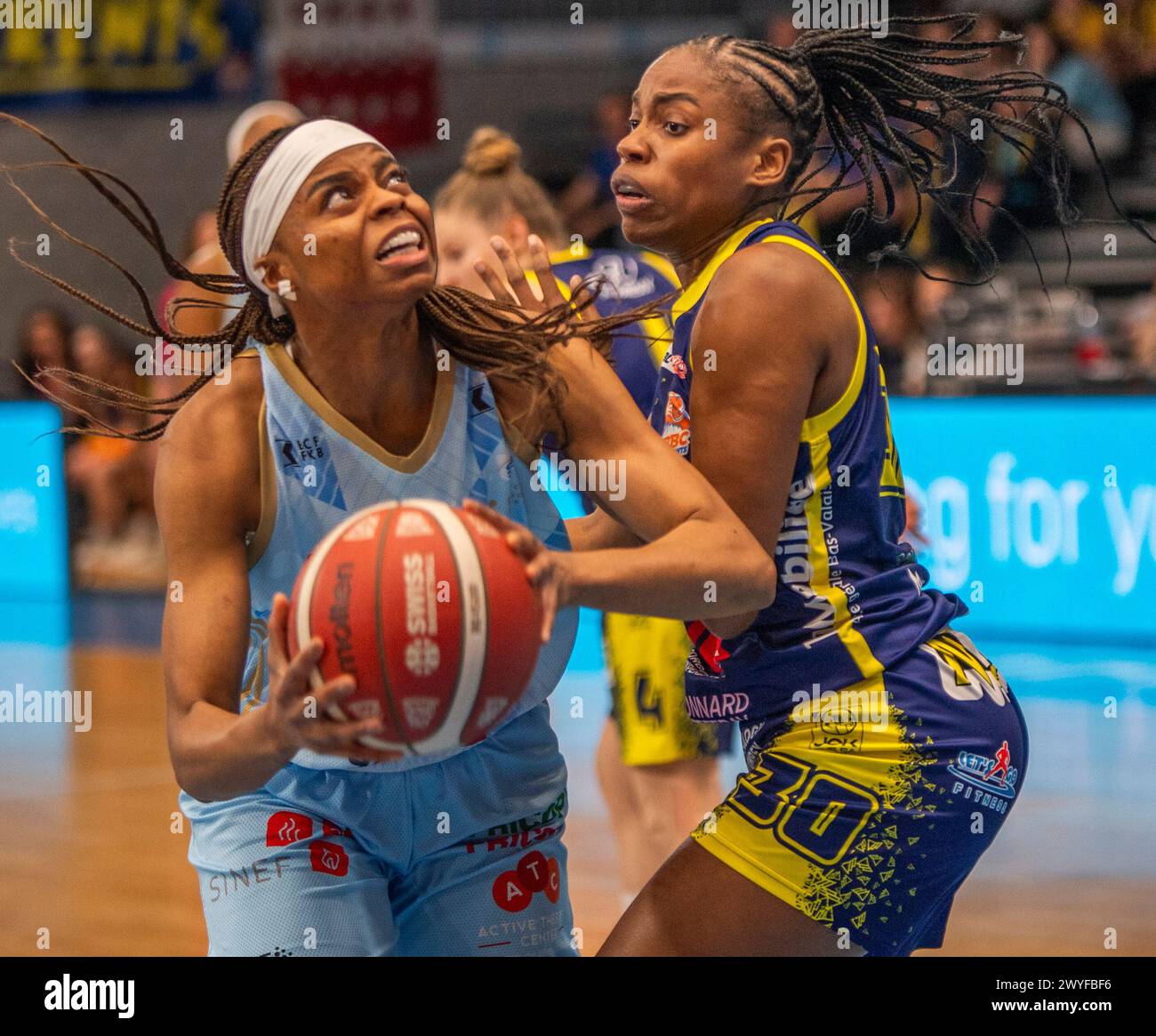 Fribourg, Fribourg, Switzerland. 6th Apr, 2024. Fribourg Switzerland, 04/06/2024: CESARIA AMBROSIO of BCF Elfic Fribourg #3 against GLORIA IKATEKA LOOSA of Portes du Soleil BBC Troitorrents #30 during Patrick Baumann Swiss Cup. Patrick Baumann Swiss Cup took place at Saint-Leonard hall in Fribourg.BCF Elfic Fribourg wins 78-61. (Credit Image: © Eric Dubost/ZUMA Press Wire) EDITORIAL USAGE ONLY! Not for Commercial USAGE! Credit: ZUMA Press, Inc./Alamy Live News Stock Photo