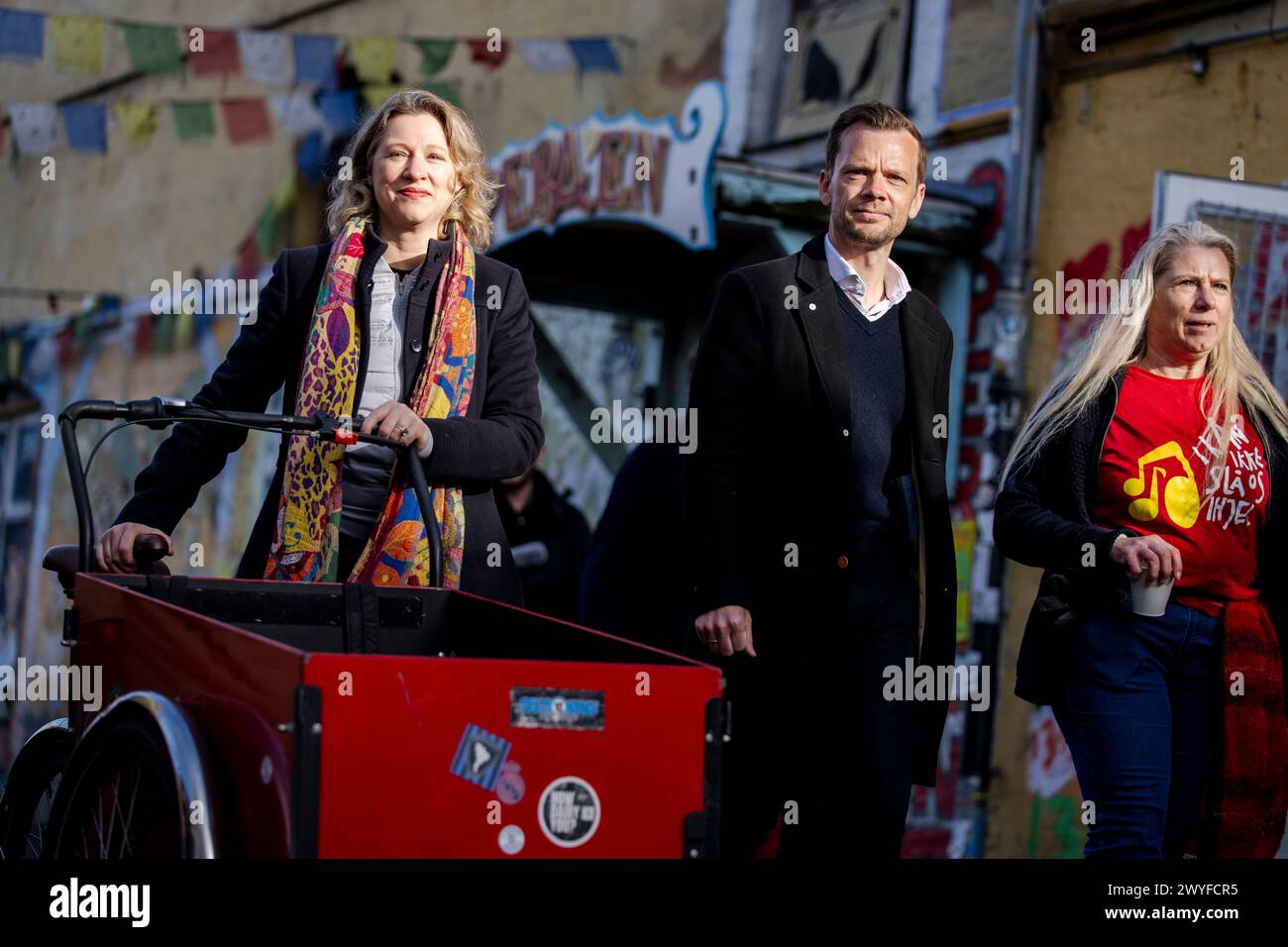 Copenhagen, Denmark. 06th Apr, 2024. City Mayor of Copenhagen, Sophie Haestorp Andersen, and Justice Minister Peter Hummelgaard arrive as the citizens of the free village Christiania jointly dig up the cobblestones at Pusher Street, in Copenhagen, Denmark, Saturday April 6, 2024. Credit: Ritzau/Alamy Live News Stock Photo