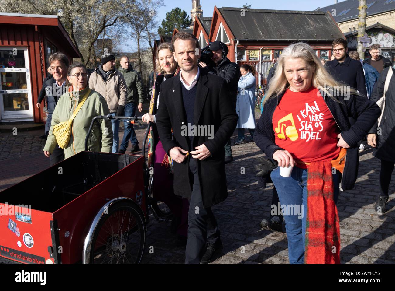 Lord Mayor of Copenhagen Municipality Sophie Haestorp Andersen of the Social Democratic Party and Minister of Justice, Peter Hummelgaard of the Social Democratic Party arrive at Freetown Christiania during a action day Saturday 6 April 2024. At a meeting at Christiania in March, it was decided that the so-called Pusher Street in the famous Copenhagen neighbourhood should be dug up during a so-called action day 6 April. It is planned that Christianitter aided by workmen will dig up the street. People from outside Christiania are welcome to participate as informed by Christiania s spokesperson. Stock Photo