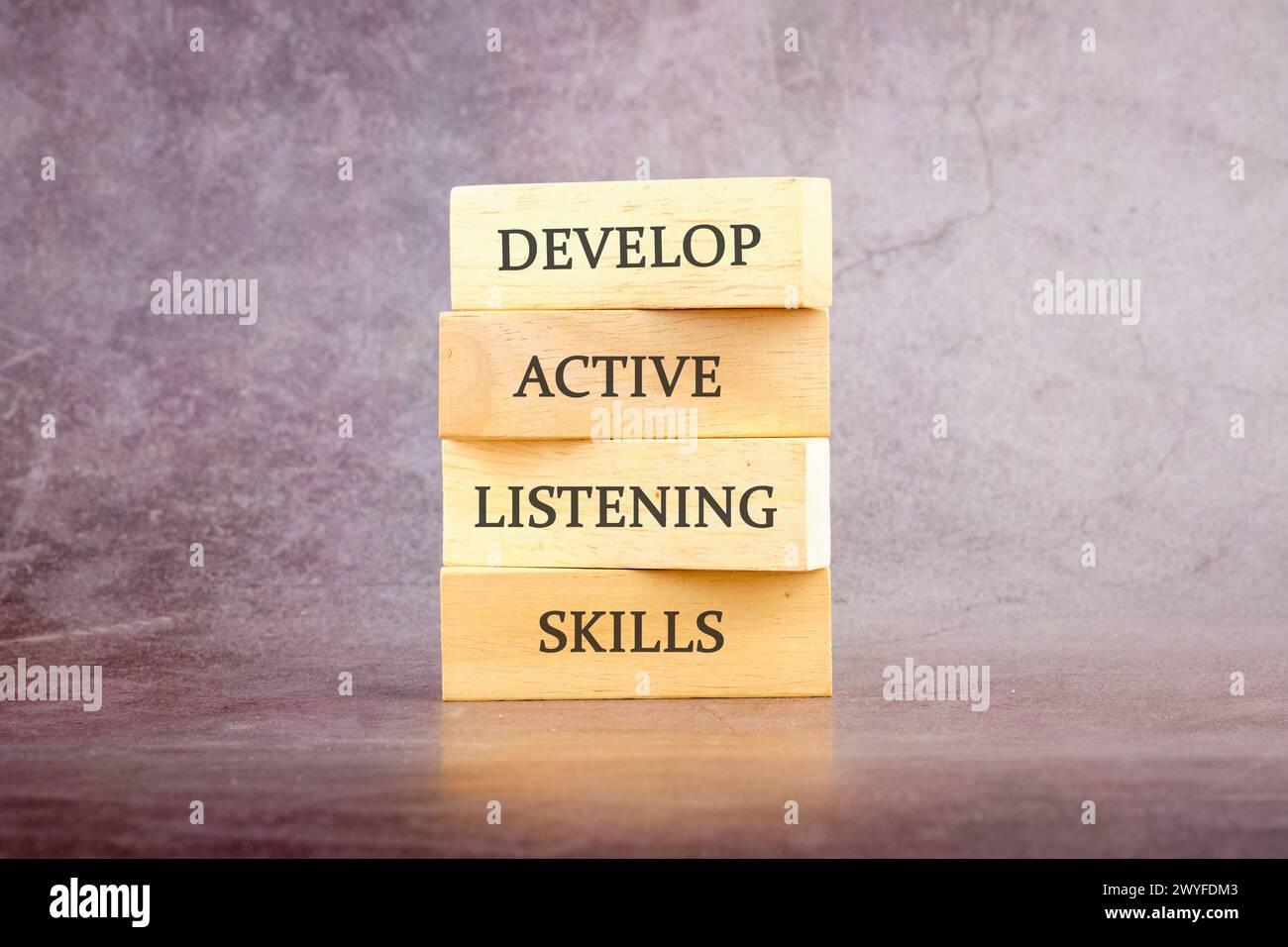 Concept word Develop active listening skills on wooden blocks. The ...