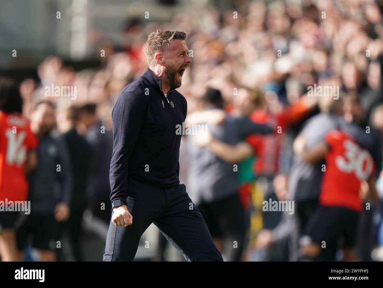 Luton Town manager Rob Edwards celebrates his teams winning goal during the Premier League match at Kenilworth Road, Luton. Picture date: Saturday April 6, 2024. Stock Photo