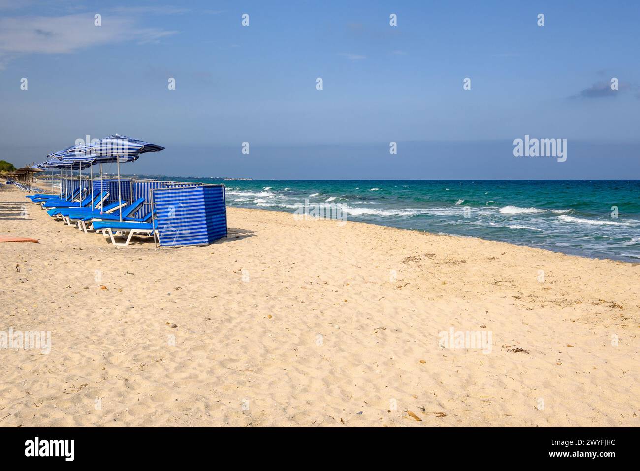 Beautiful Marmari beach with golden sand and emerald waters. Kos island, Greece Stock Photo