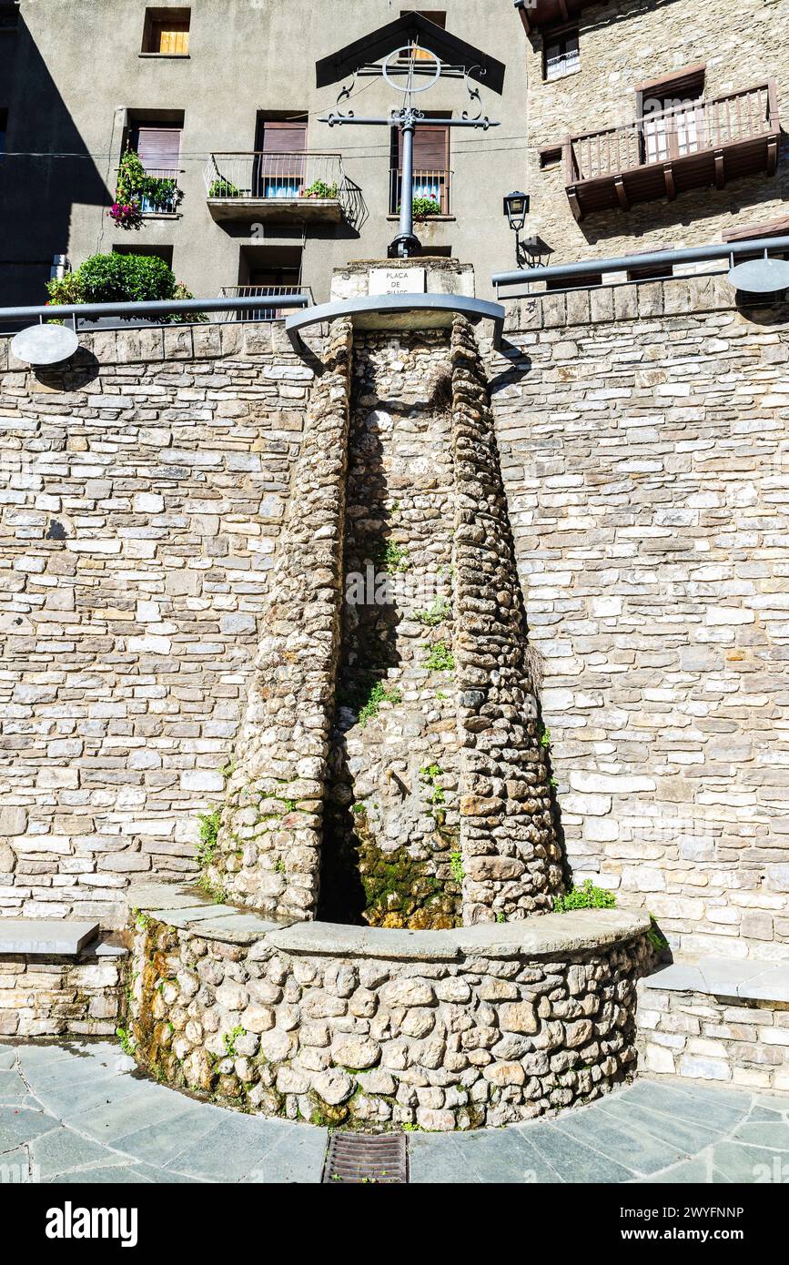 Fountain in Biuse square of the rustic village of Llavorsi, Lleida, Catalonia, Spain Stock Photo
