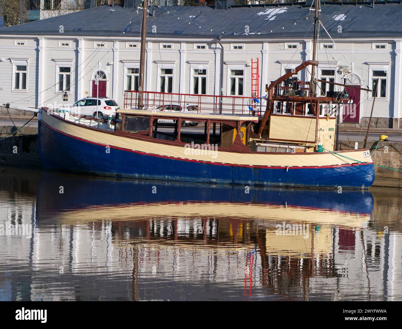 Old wooden colorful boat in Aurajoki, Turku Finland Stock Photo
