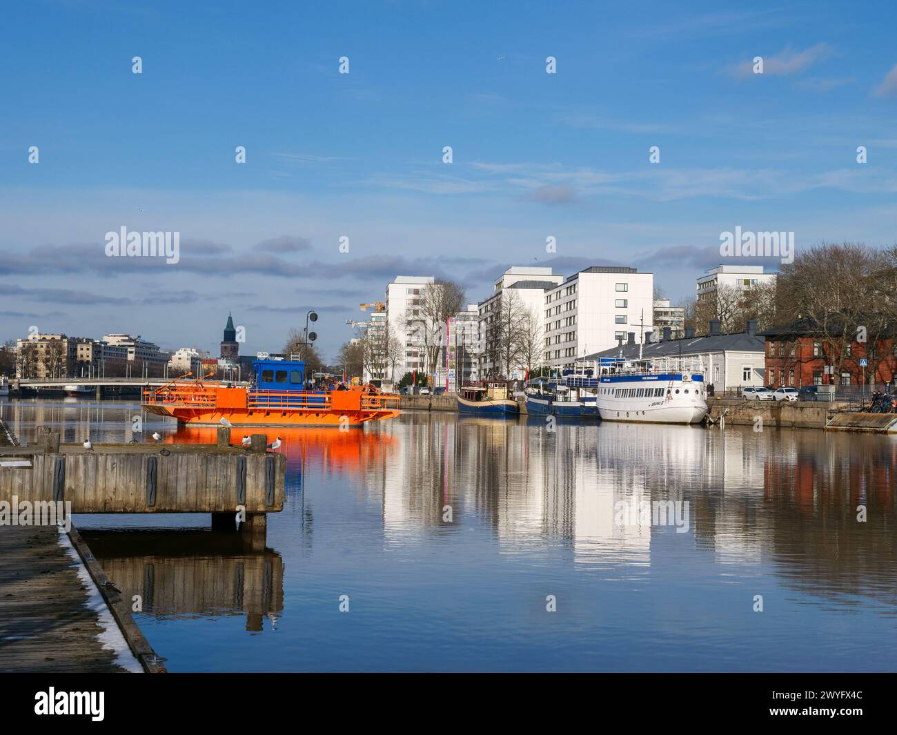 A beautiful view on the shore of Aura river on a sunny spring day. Turku, Finland Stock Photo