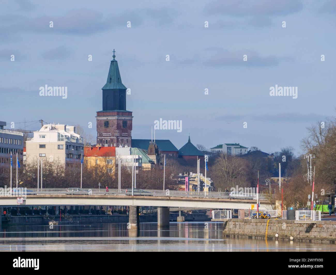 A beautiful sunny spring day. Martins bridge above Aurajoki and the Turku Cathedral in the background Stock Photo