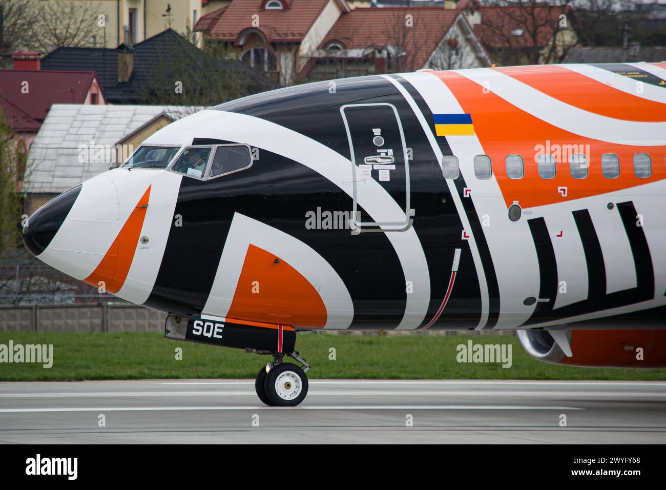 Cockpit close-up of a SkyUp airlines Boeing 737-700 wearing special FC Shakhtar livery taxiing after landing in Lviv Stock Photo