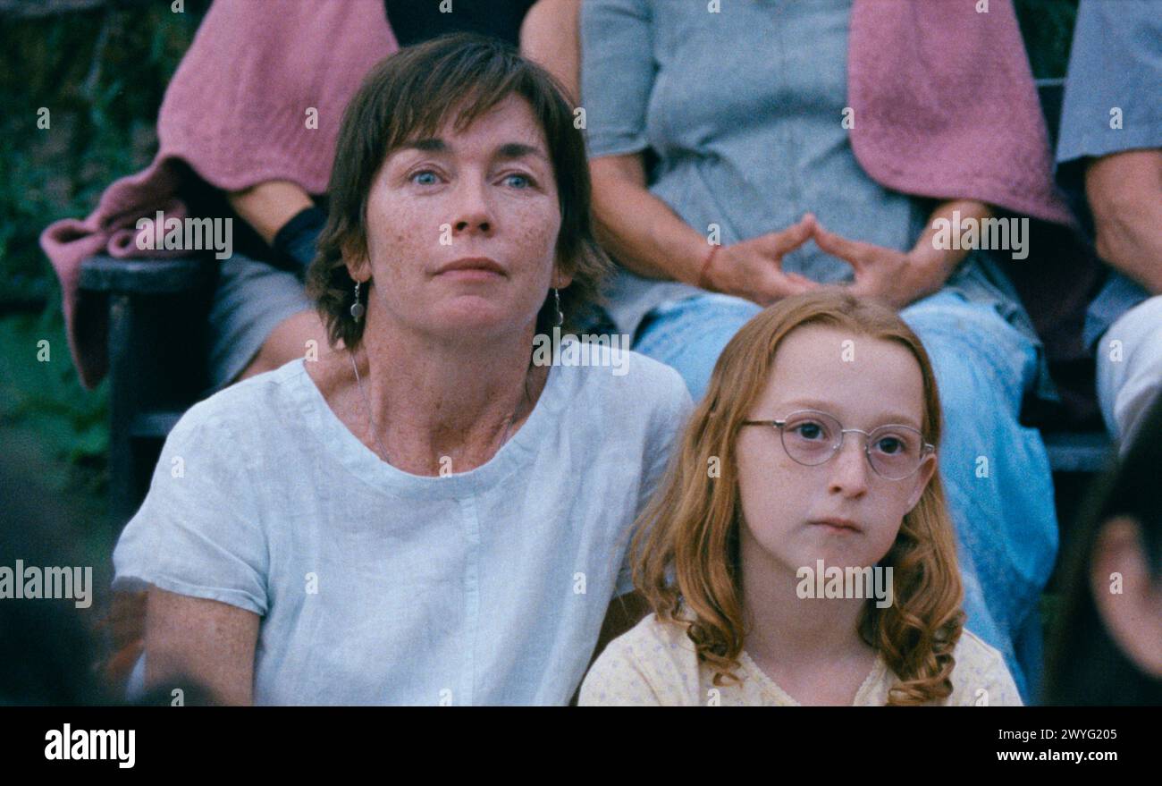 Janet Planet (2023) directed by Annie Baker and starring Julianne Nicholson, Zoe Ziegler, Luke Philip Bosco and June Walker Grossman. 11-year-old Lacy spends the summer of 1991 at home, enthralled by her own imagination and the attention of her mother, Janet. As the months pass, three visitors enter their orbit, all captivated by Janet. Publicity still.***EDITORIAL USE ONLY*** Credit: BFA / A24 Stock Photo