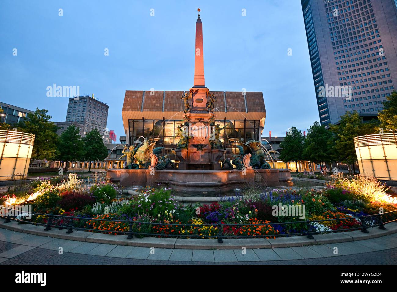 The Gewandhaus and Mendebrunnen in Leipzig, Germany at night Stock Photo