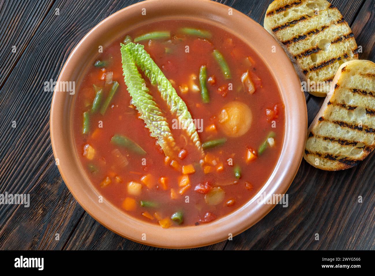 Portion of Minestrone soup made with vegetables and stock Stock Photo