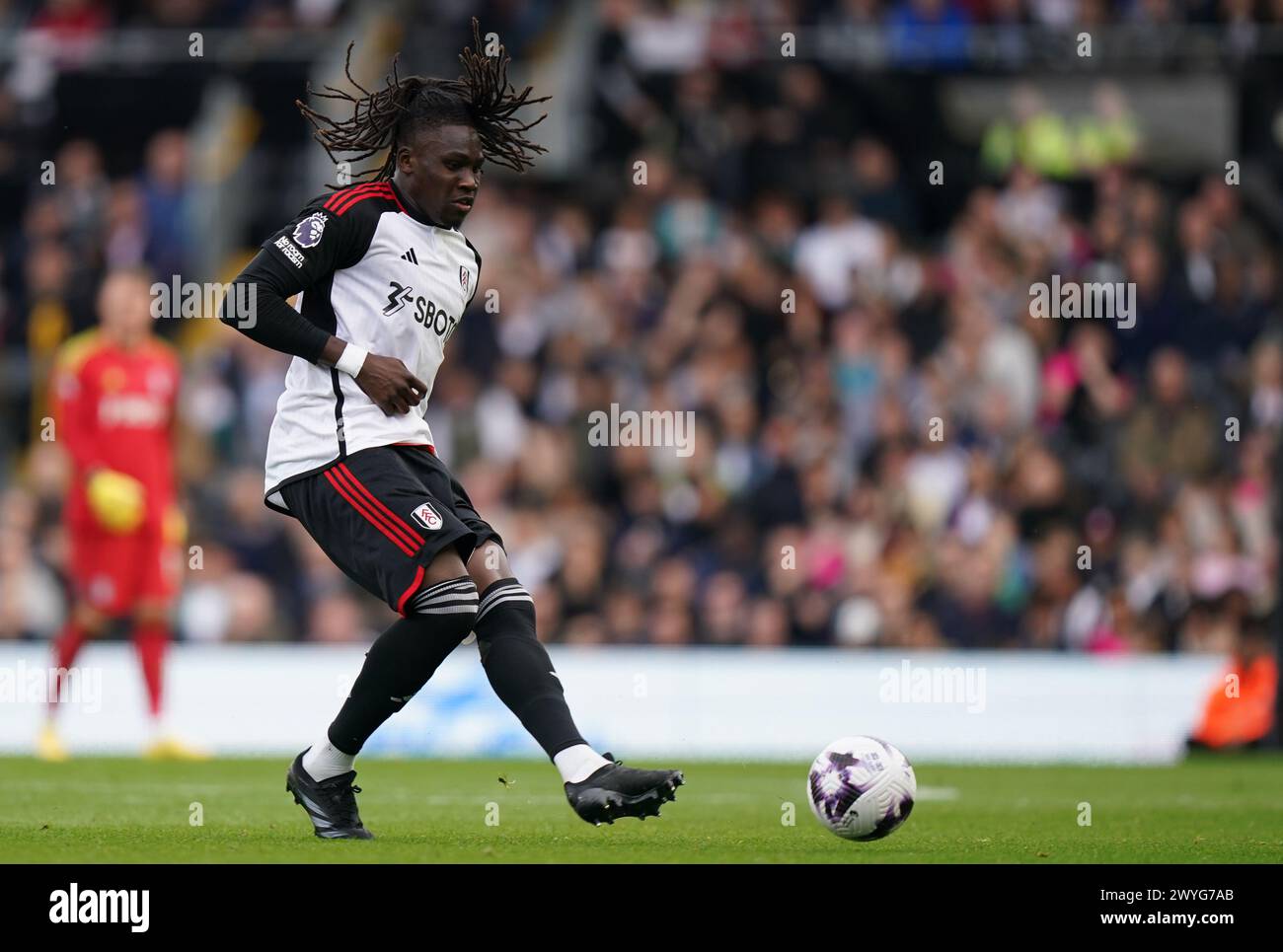 LONDON, ENGLAND - APRIL 6: Calvin Bassey of Fulham during the Premier League match between Fulham FC and Newcastle United at Craven Cottage on April 6, 2024 in London, England.(Photo by Dylan Hepworth/MB Media) Stock Photo