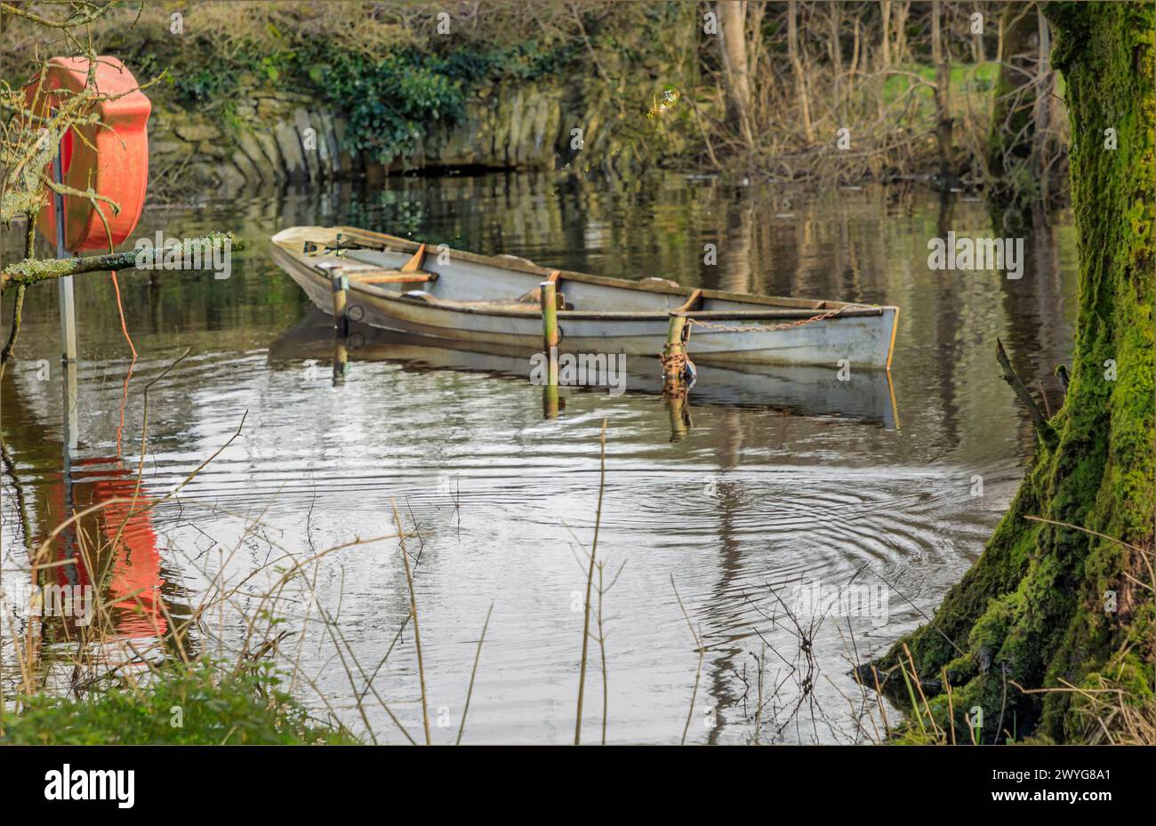 Wooden boat tied buoy hi-res stock photography and images - Alamy