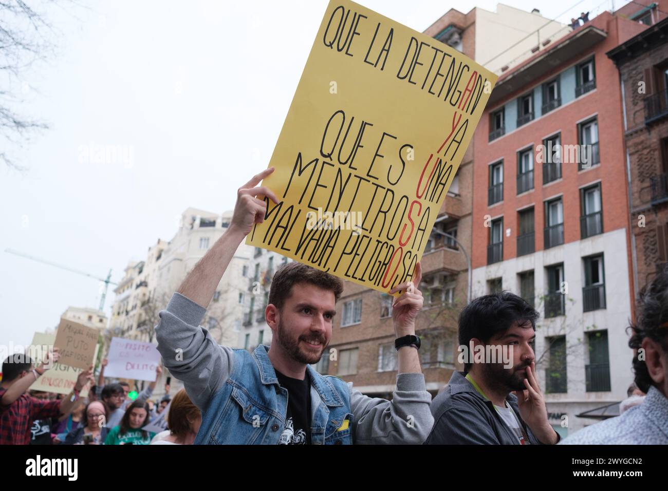 protesters outside the PP headquarters to demand the resignation of Isabel Díaz Ayuso due to her partner's corruption scandals April 06, 2024 in Madri Stock Photo