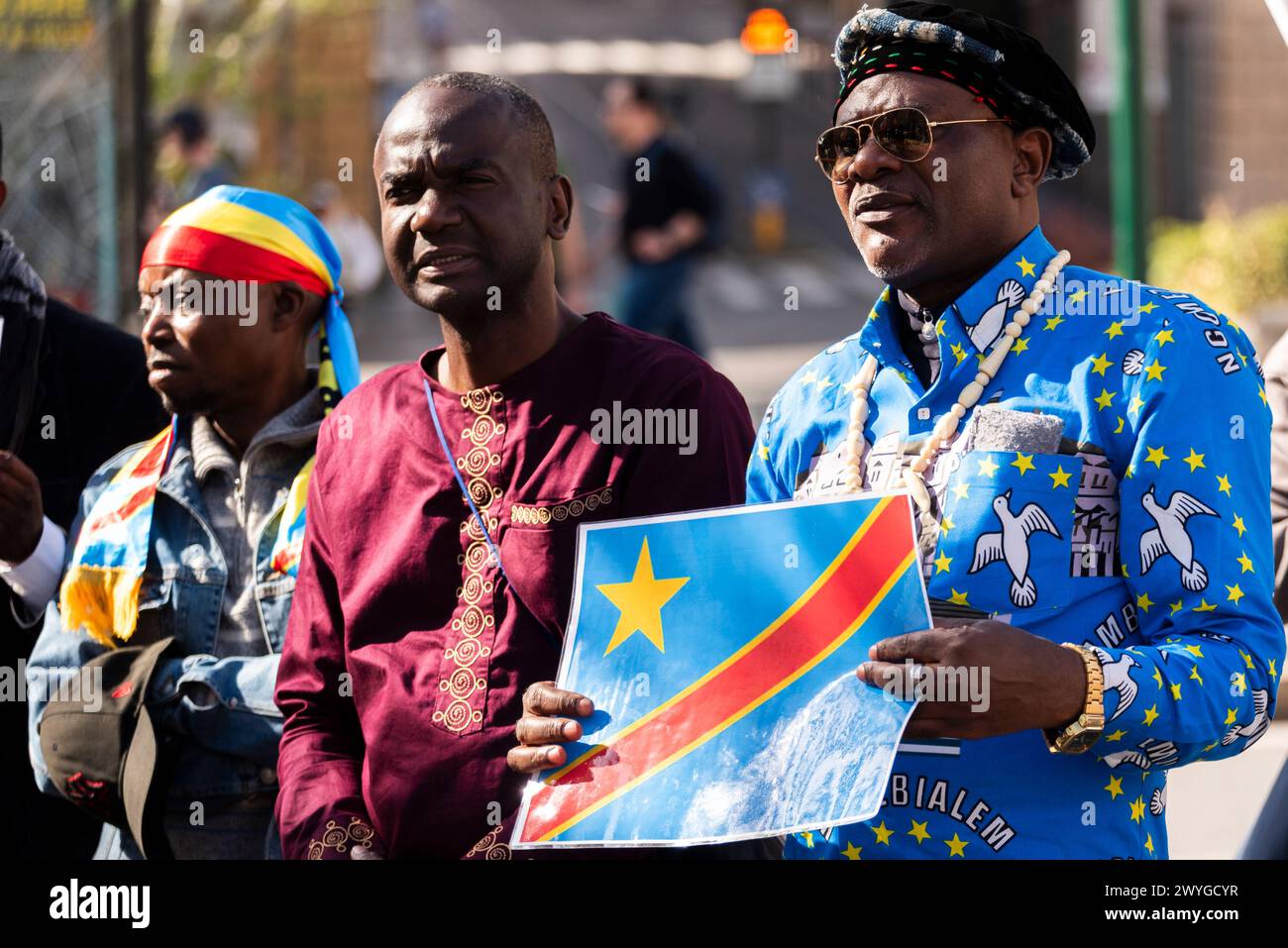 Demo of the Free African Movement to denounce the genocide in Congo in the photo person and Congo flag.Editorial Usage Only! Not for Commercial Usage! Stock Photo