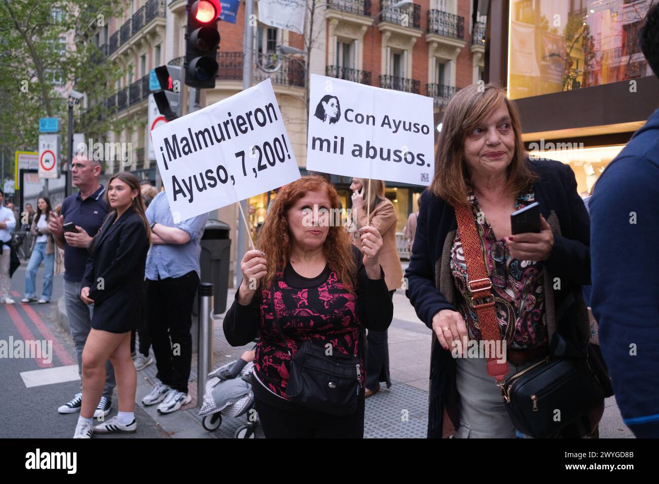 protesters outside the PP headquarters to demand the resignation of Isabel Díaz Ayuso due to her partner's corruption scandals April 06, 2024 in Madri Stock Photo