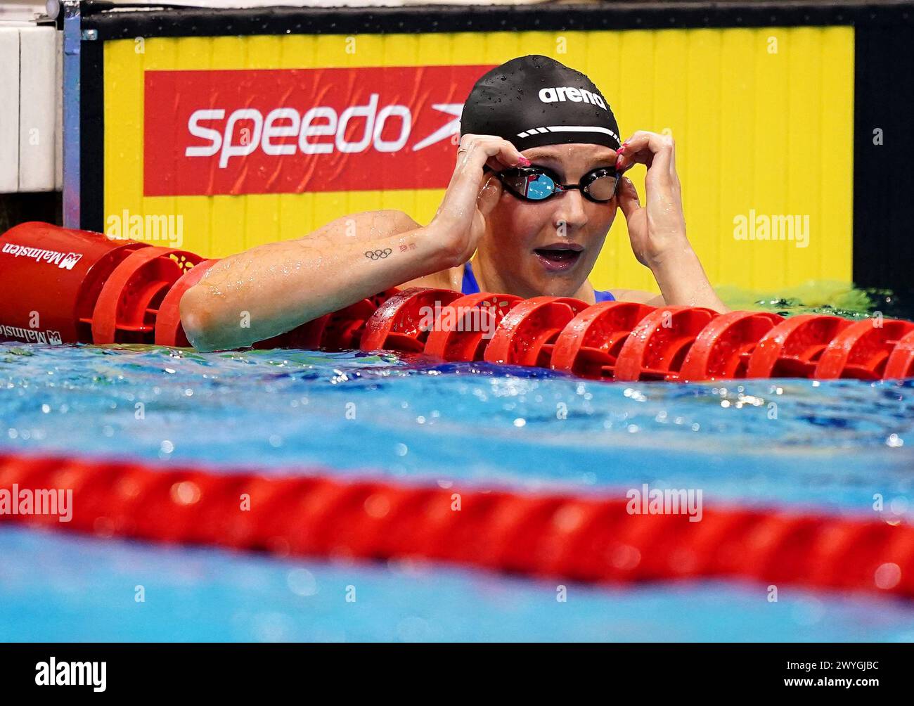 Abbie Wood reacts after winning the Women's 200m IM Final on day five