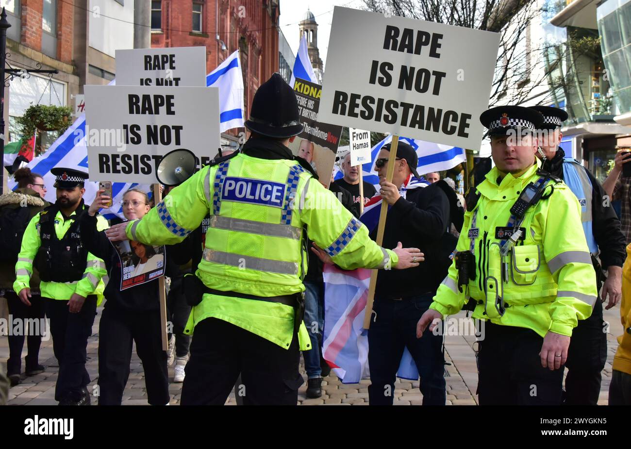 Small Size Protest A small pro Israel protest carrying placards which include a 'rape is ...