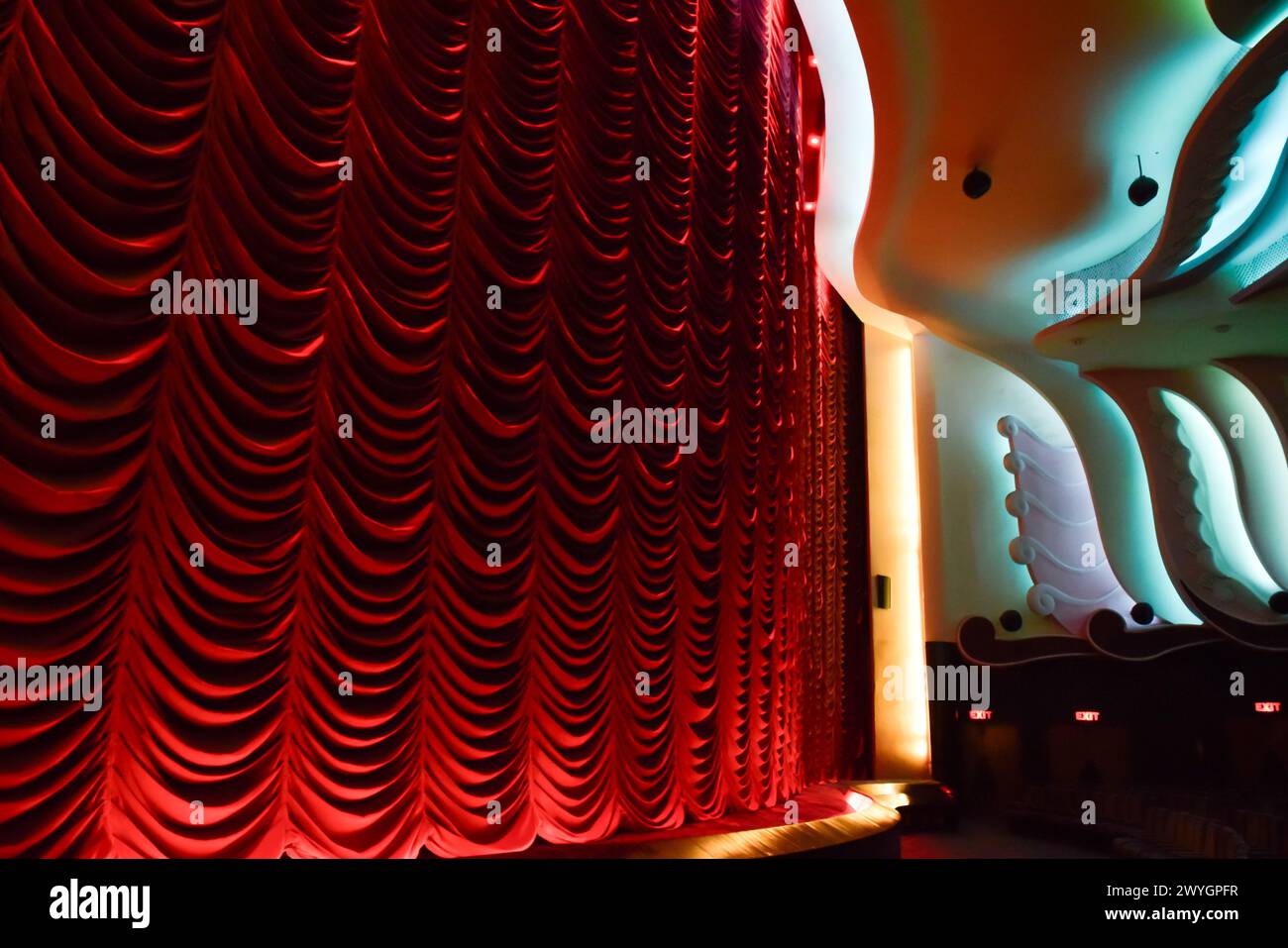 Raj Mandir Theater in Jaipur with illuminated red velvet looms with stalls Stock Photo