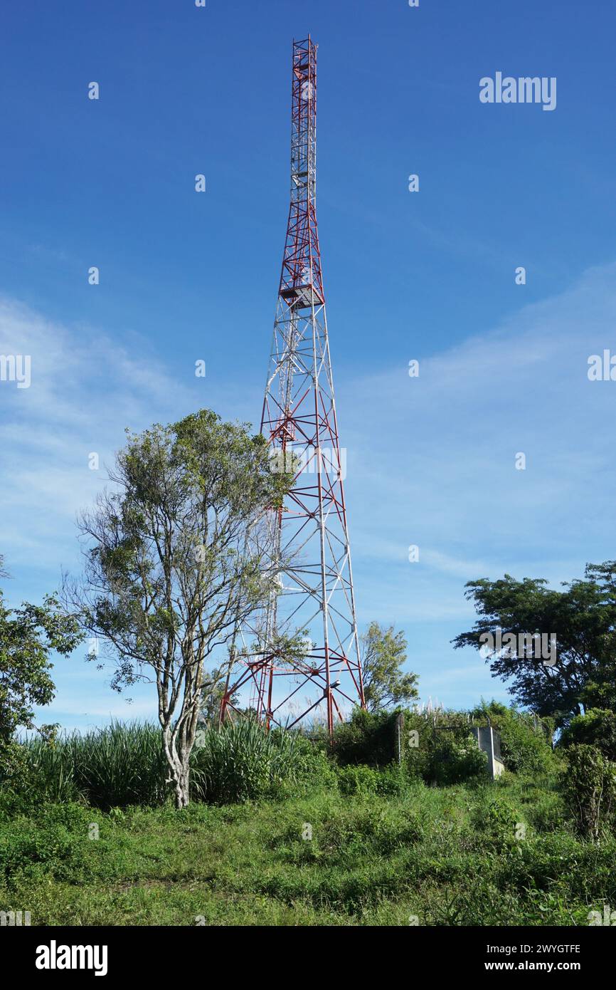 White  and red tower with blue sky background in nature Stock Photo