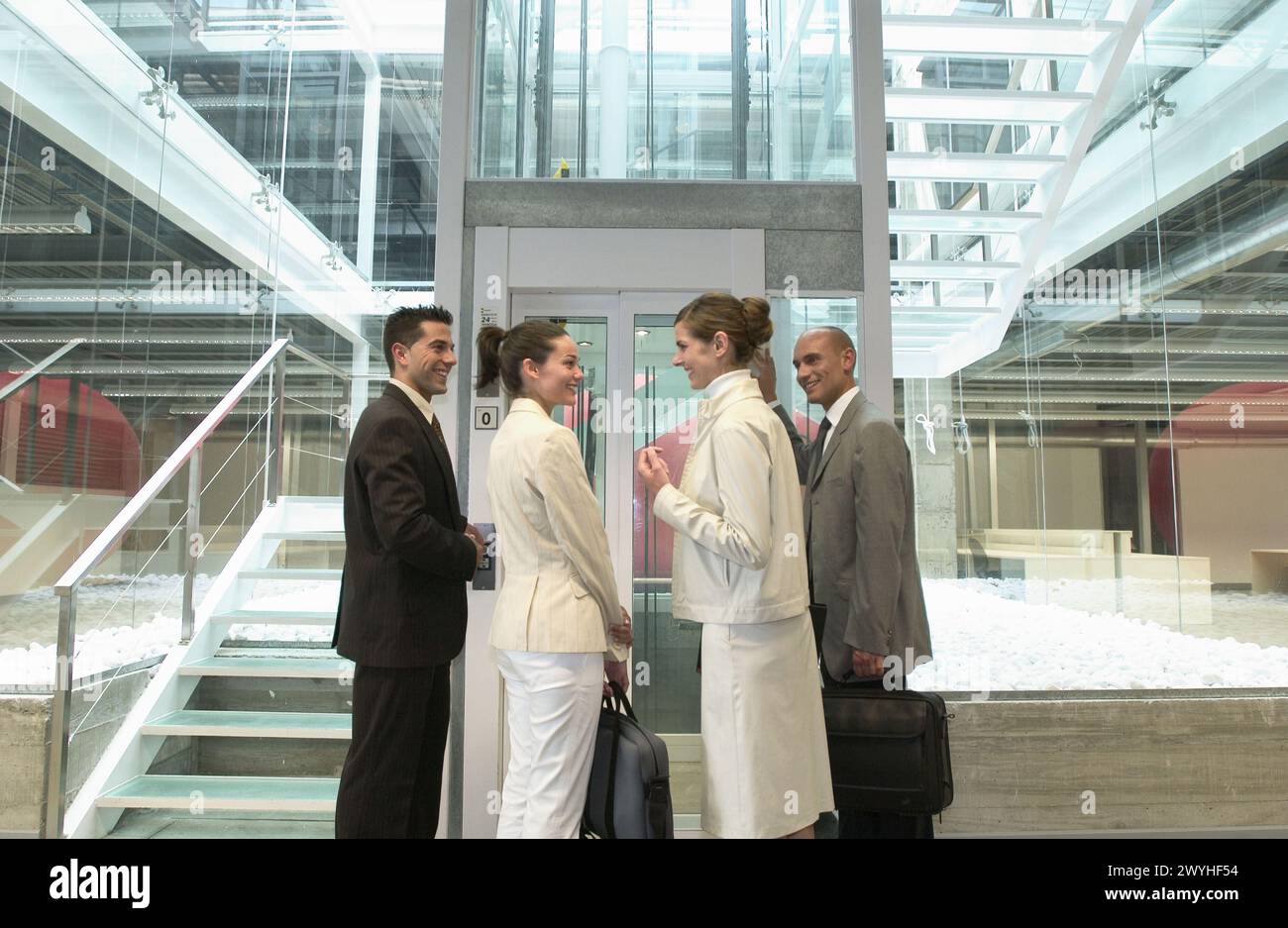 Businessman waiting lift hi-res stock photography and images - Alamy