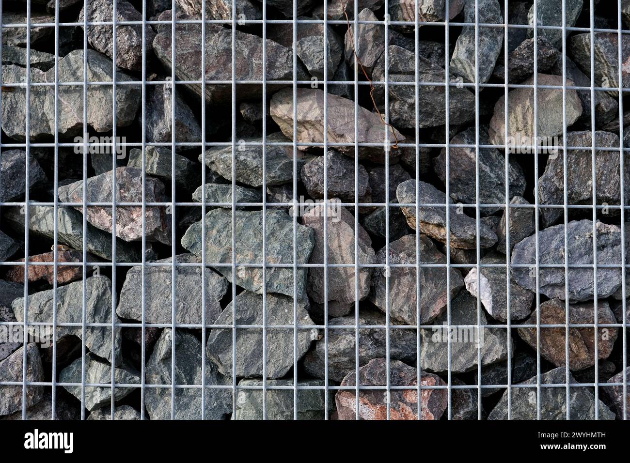 Stone and Metal Mesh Fusion: Textured Background Stock Photo