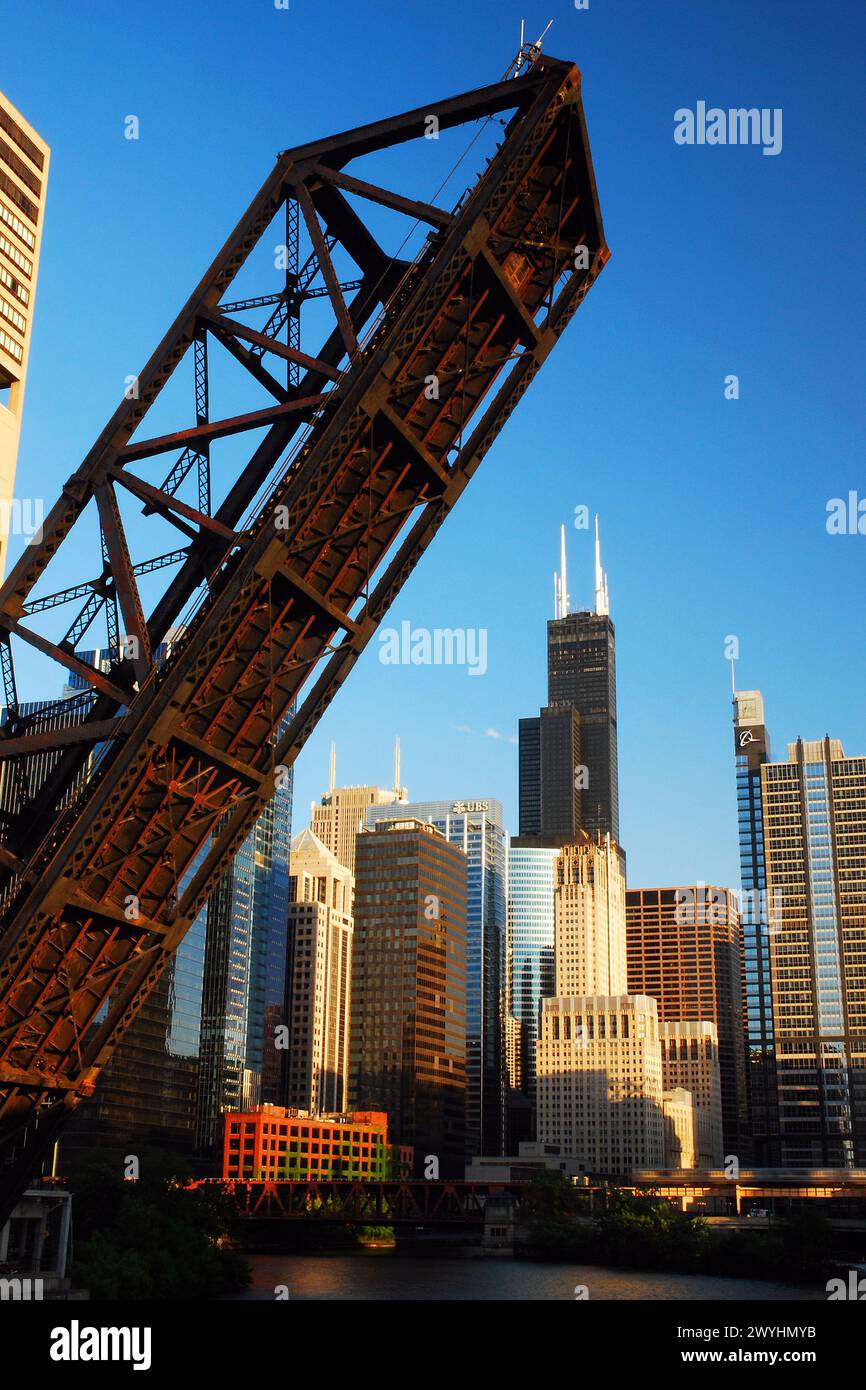 The Kedzie Street Bridge in a permanent open position, frames the Sears Tower, now Willis Tower and the skyscraper buildings in Chicago Stock Photo
