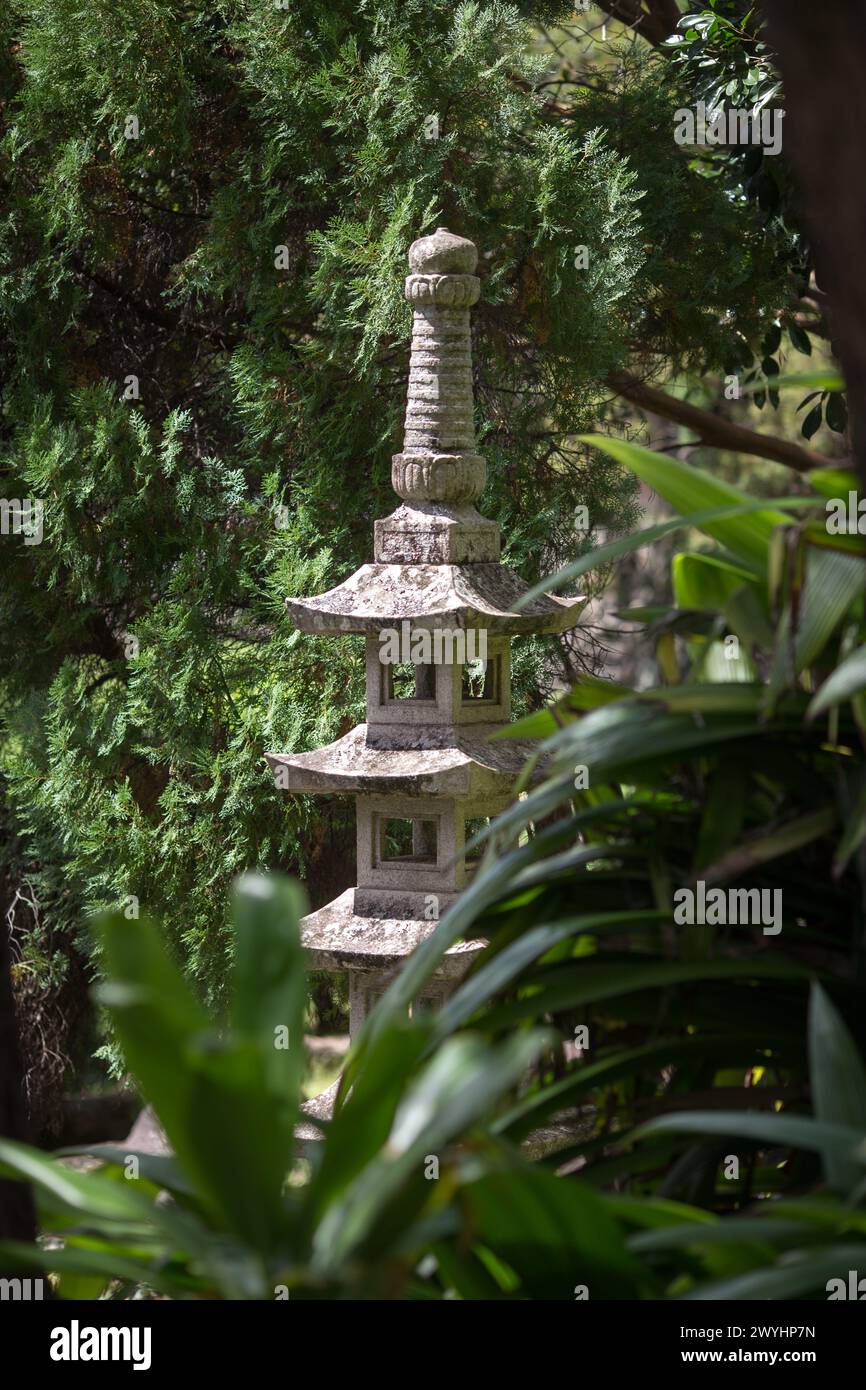 Kepaniwai Park, the aisian heritage gardens on the island of mauifeature statues, towering trees, a pagoda, koi fish, and beautiful surroundings Stock Photo