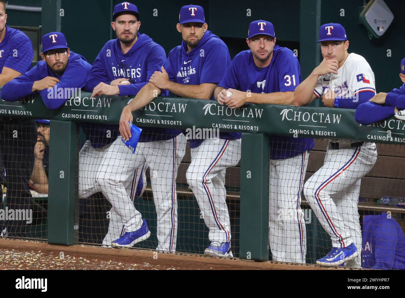 Arlington, Texas, USA. 6th Apr, 2024. Texas Rangers pitchers (from left to right) Dane Dunning (33), Andrew Heaney (44), Nathan Eovaldi (17), and Max Scherzer (31), stand alongside second base Justin Foscue (56) during the Major League Baseball game between the Houston Astros and Texas Rangers at Globe Life Field in Arlington, Texas. Rangers defeated Astros 7-2. Greg Atkins/CSM/Alamy Live News Stock Photo