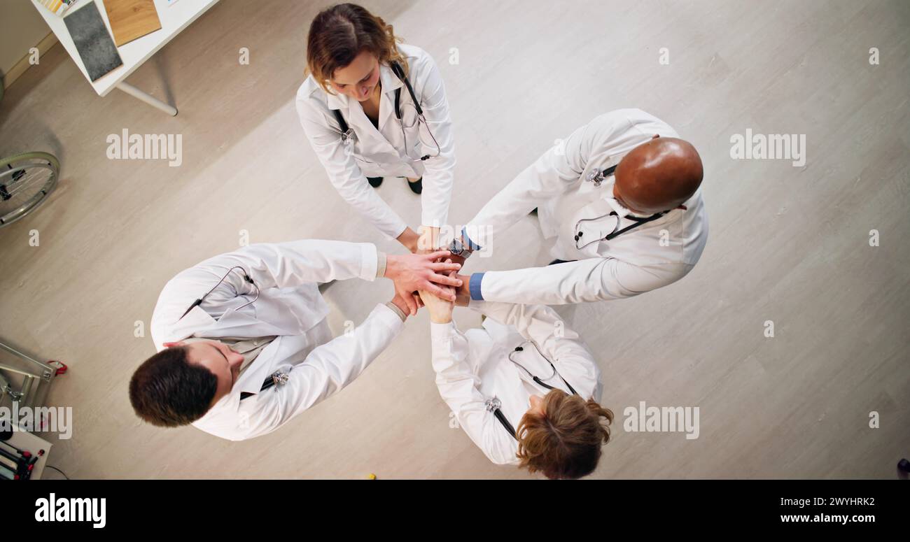 Motivated Team Of Diverse Hospital Doctors Hands Stock Photo