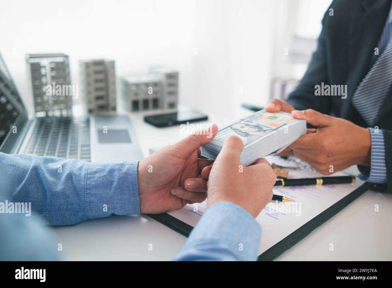 Real estate brokers are bribing government officials with cash issue