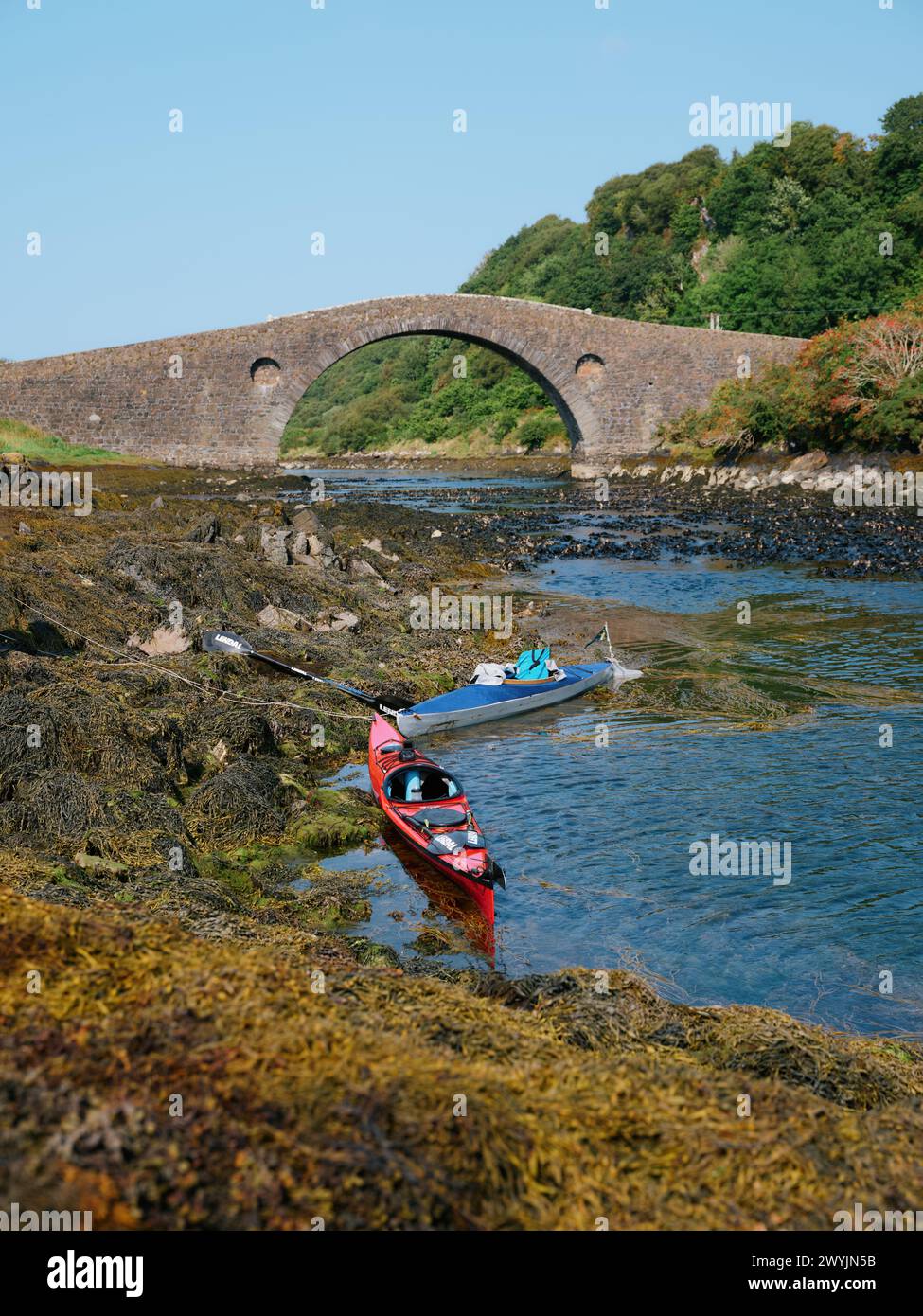 Two touring kayaks at Clachan Bridge a simple, single-arched, hump ...