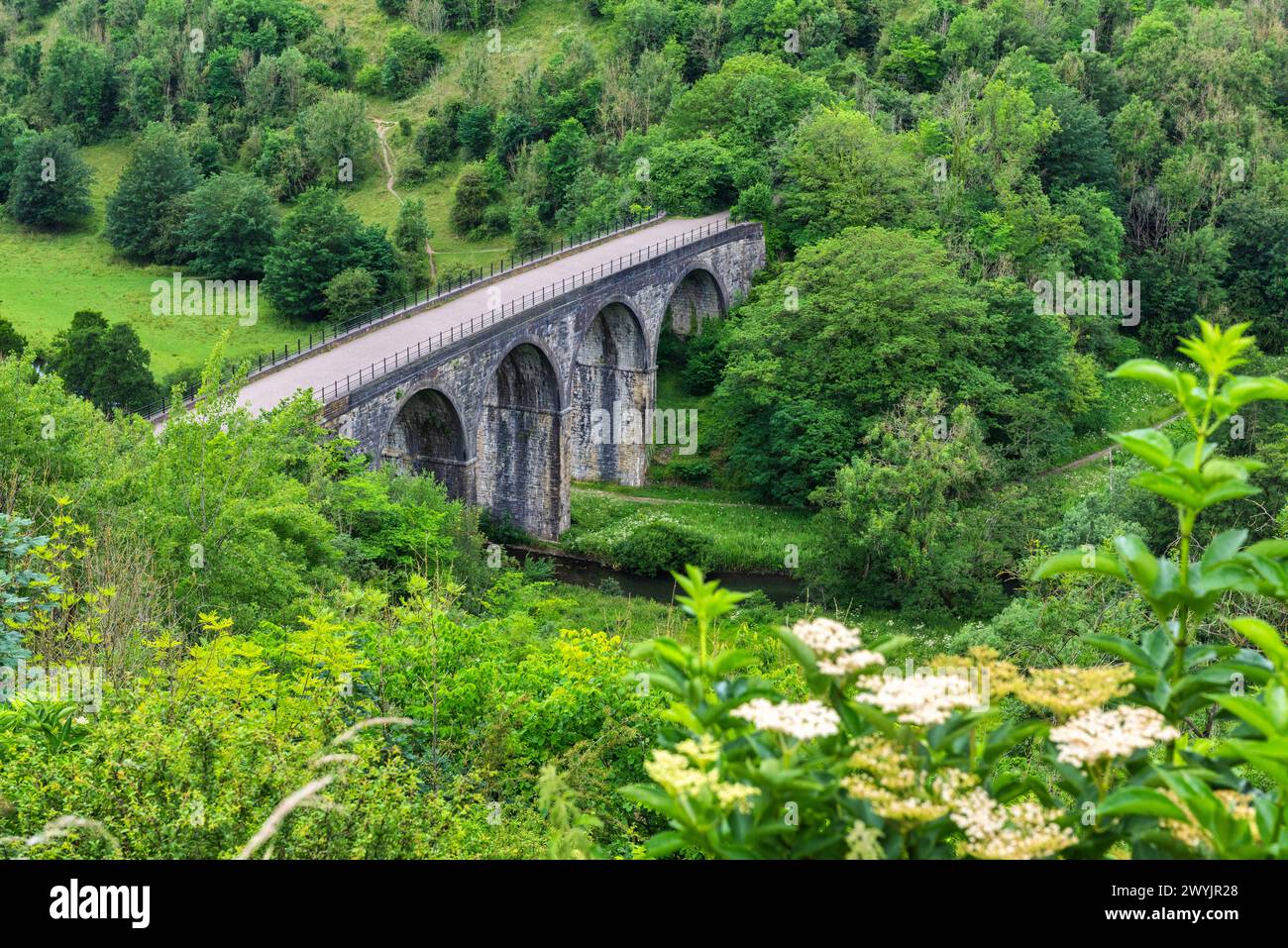 Monsal Head and Monsal Dale and the old railway viaduct over the river Wye in the Peak District in Derbyshire, England Stock Photo