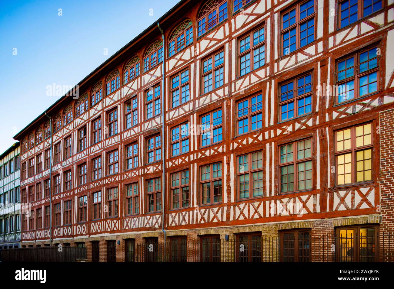 France, Seine-Maritime, Elbeuf-sur-Seine, holder of the label Villes et Pays d'Art et d'Histoire (VPAH), former Petou-Clarenson textile factory with wooden sides from the 18th century, dating from the cloth industry, characteristic of the industrial development of Elbeuf, rehabilitated into collective residence Stock Photo
