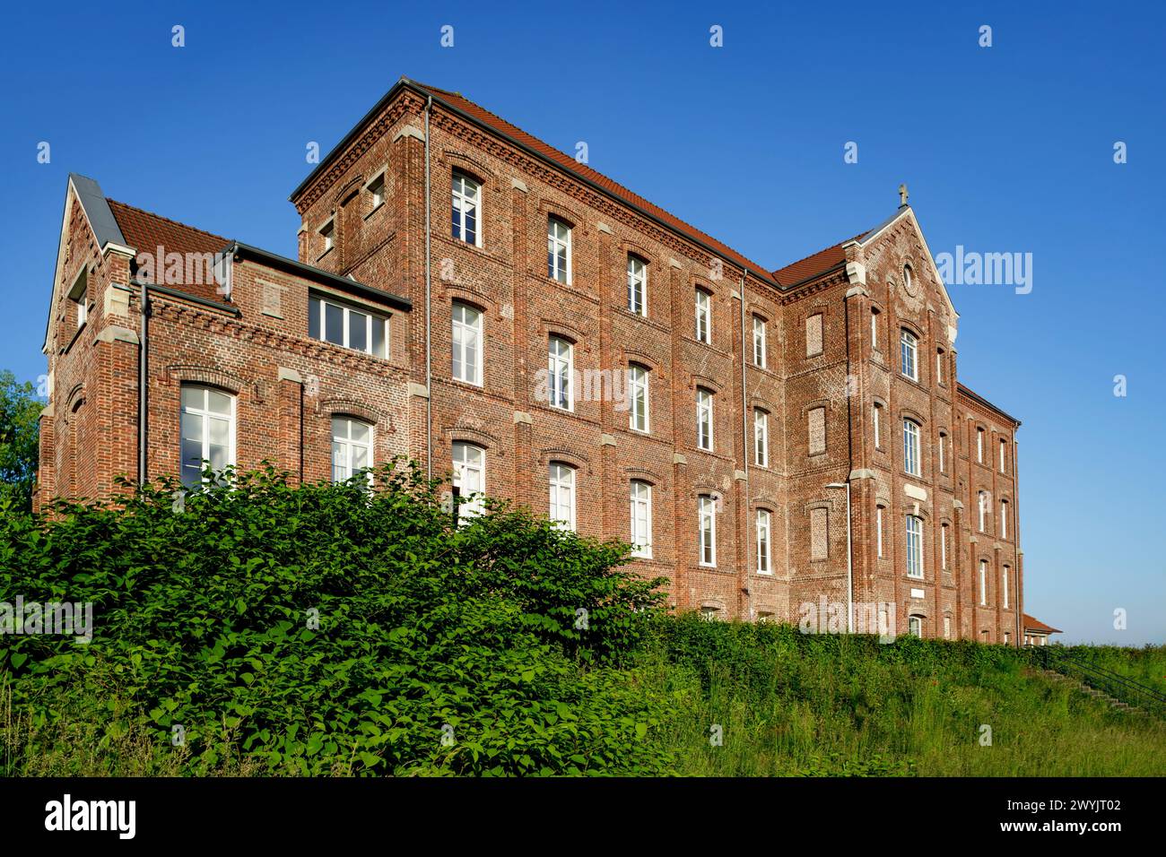 France, Seine-Maritime, Elbeuf-sur-Seine, designated as French Towns and Lands of Art and History, former Olivier and Suchetet orphanage, nowadays transformed into a collective residence Stock Photo