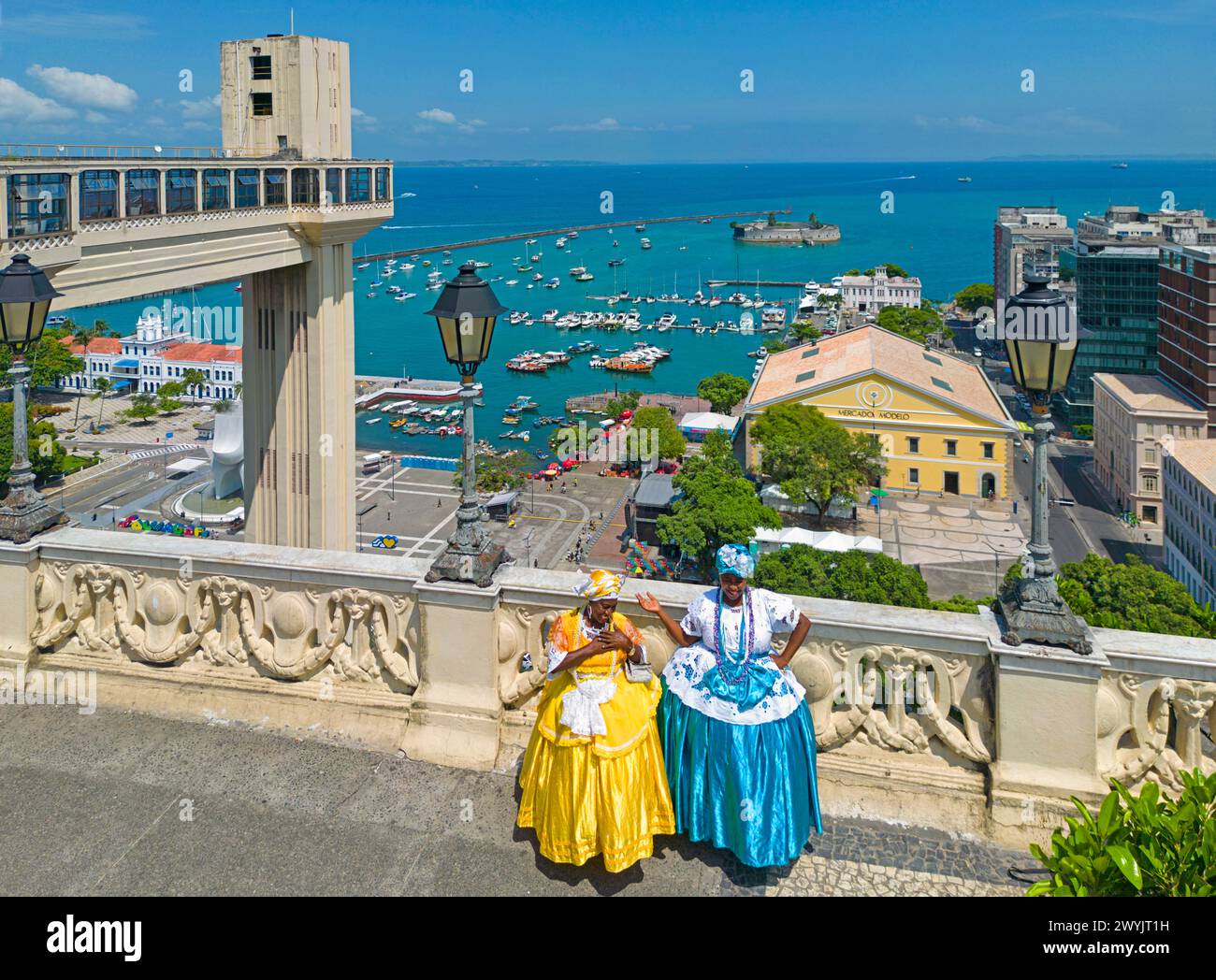 Brazil, Bahia, Salvador, Lacerda lift, the market Mercado Modelo and women from Bahia wearing a traditional dress Stock Photo