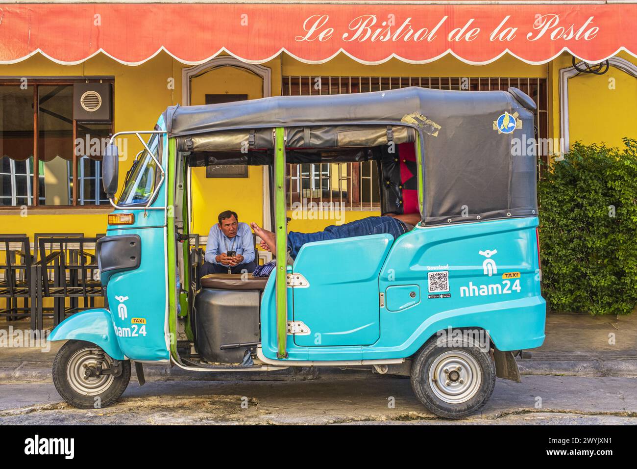 Cambodia, Phnom Penh, Wat Phnom area, rickshaw in front of Le Bistrot ...