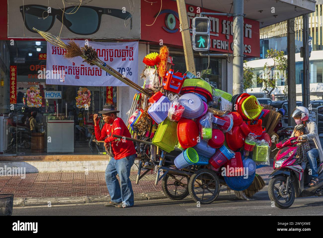 Cambodia, Phnom Penh, Prampi Makara district, street seller of plastic